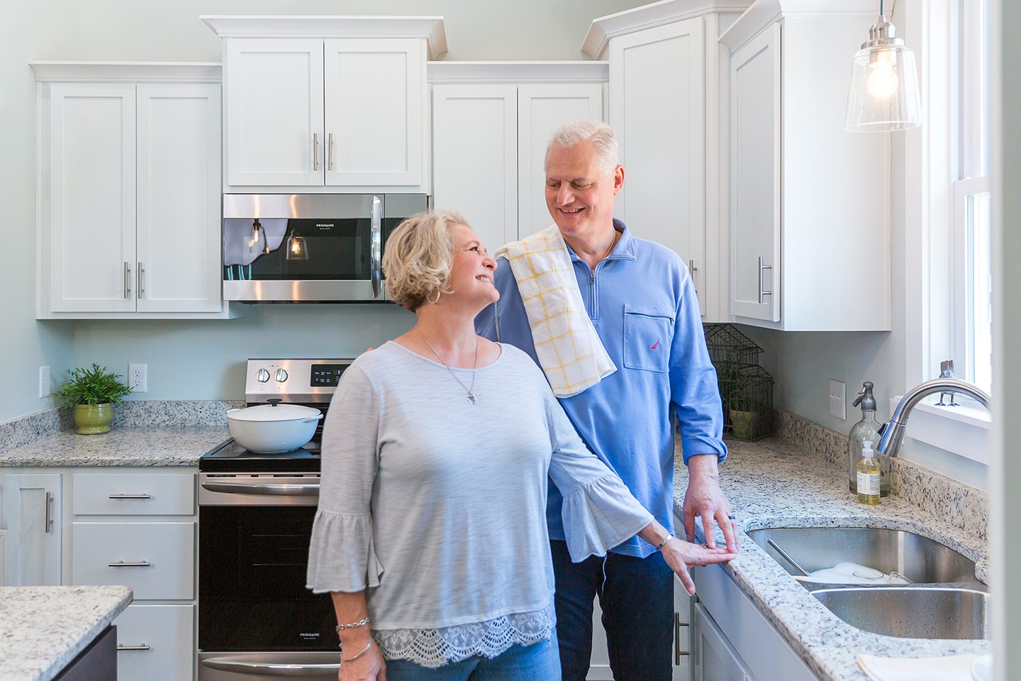 Rock River Homes couple standing in kitchen