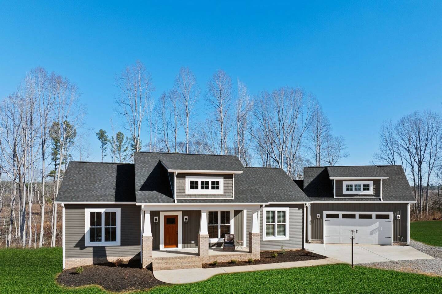 Gray house with detached garage