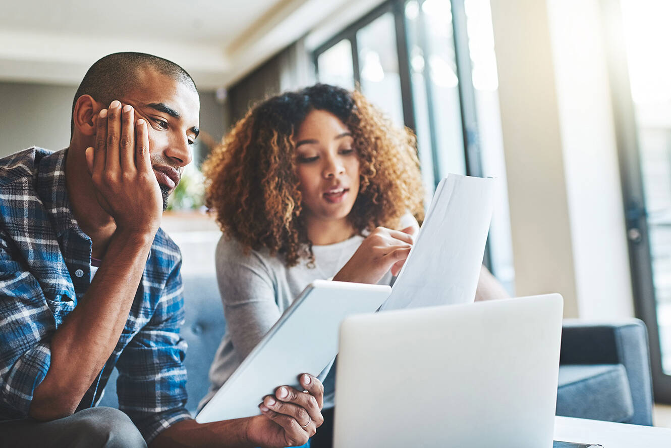 Couple looking at loan paperwork
